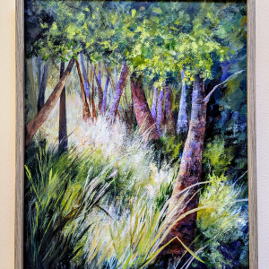 Acrylic painting of a San Juan Island forest hanging on gallery wall